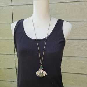 gold tone clear and green rhinestone bug pendant necklace